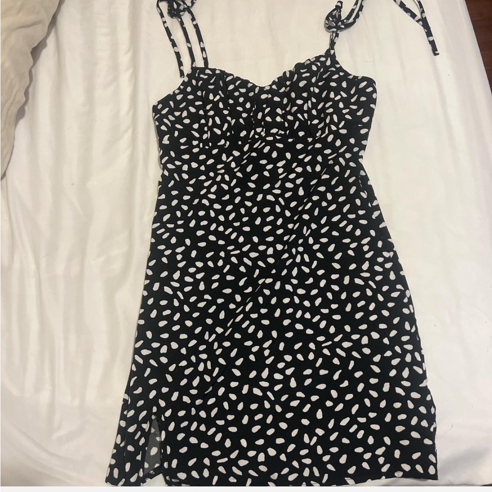 Black and white dress with ruched bust and adjustable straps!